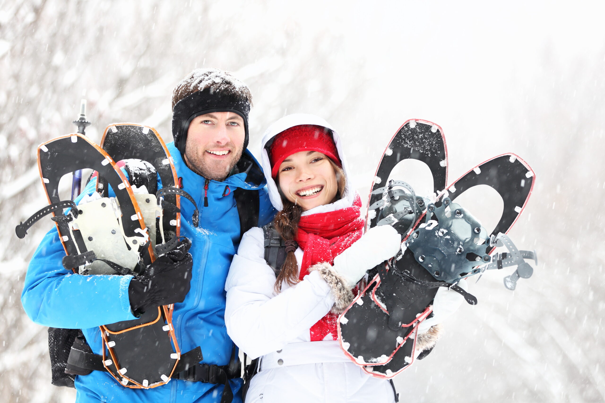 snowshoeing winter hiking couple